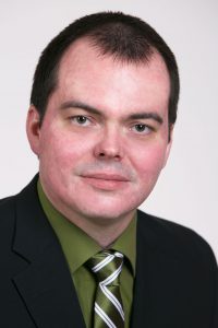 Portrait des Beirats Christian Mogalla